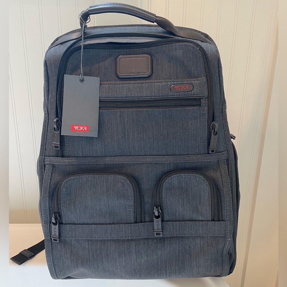 Tumi Alpha Bravo backpack, NEW with tags. Dark gray. Laptop sleeve included.